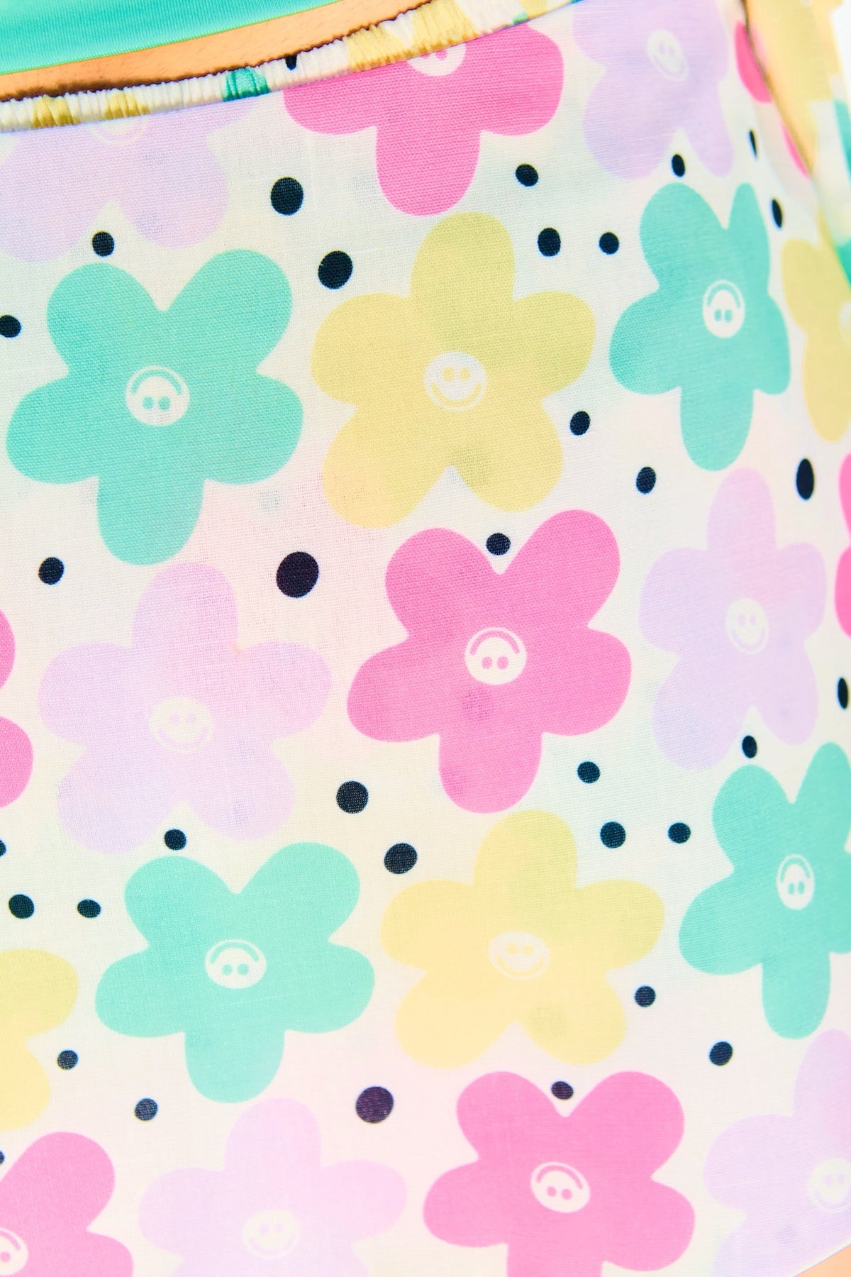 SHORT CAPA FLORES PASTEL